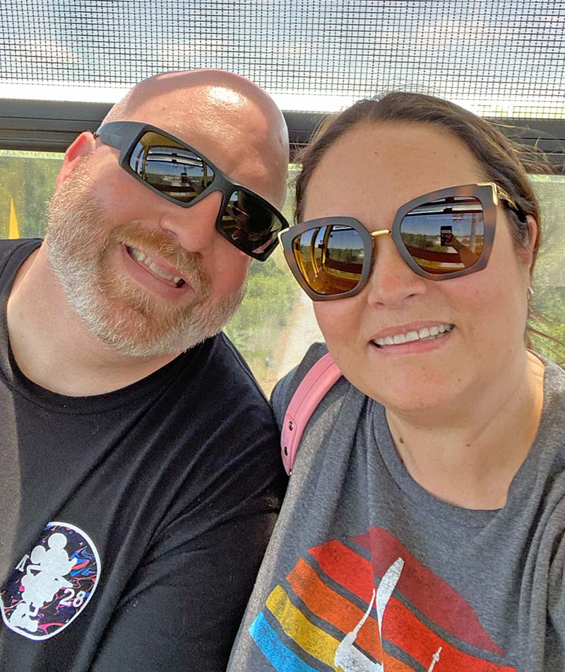 portrait of kristen olson and husband on a disney vacation